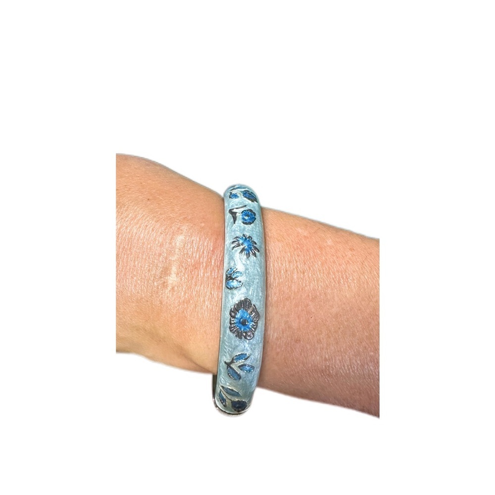 Vintage blue bracelet with floral design.